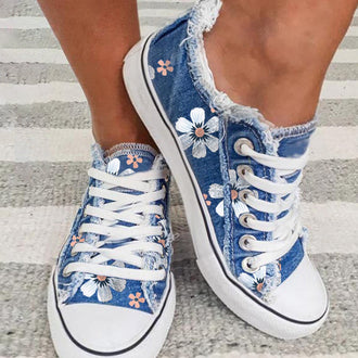 Lerrets flats med blomster