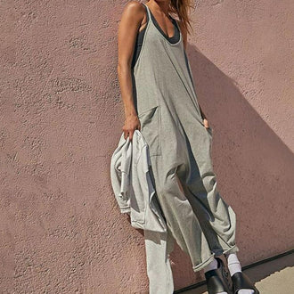 Ensfarget Jumpsuit med V-hals Sling Pocket