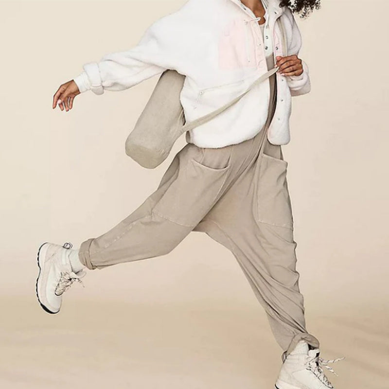 Ensfarget Jumpsuit med V-hals Sling Pocket