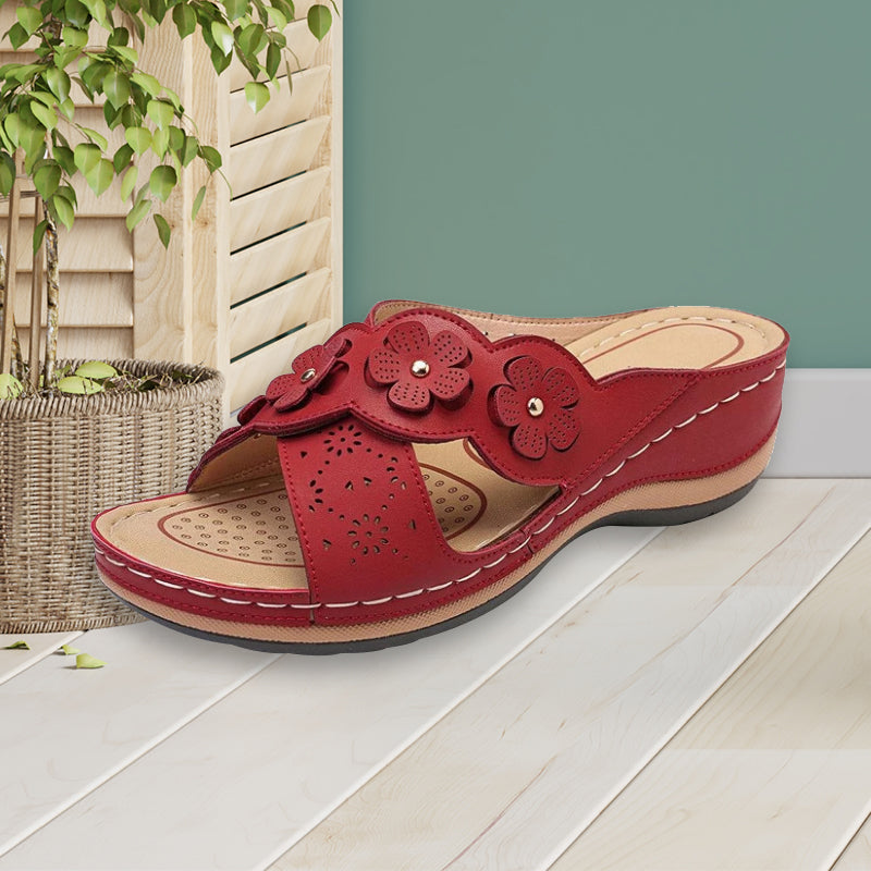 Ensfargede sandaler med blomster-design